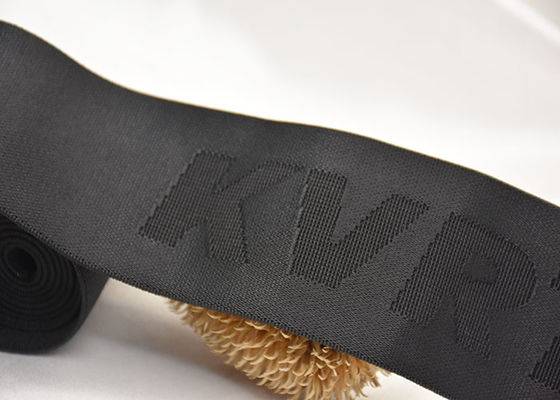 Banda elástica calificada de encargo del telar jacquar del logotipo 52m m con el material echado a un lado doble