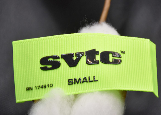 Cosa en la marca de encargo Logo Silicone Clothing Labels Washable 3D impreso