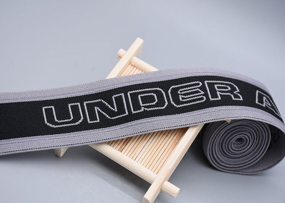 La banda elástica echada a un lado doble del telar jacquar con impreso no desliza la tira transparente del silicón